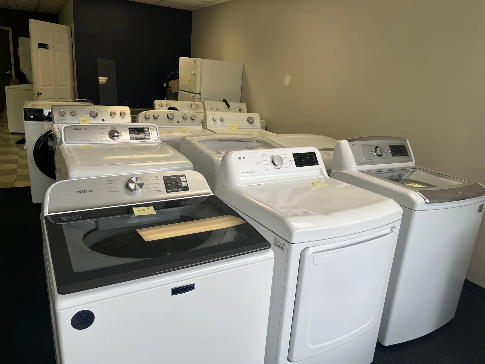 Rows of washers and dryers available in the Truth Appliances showroom